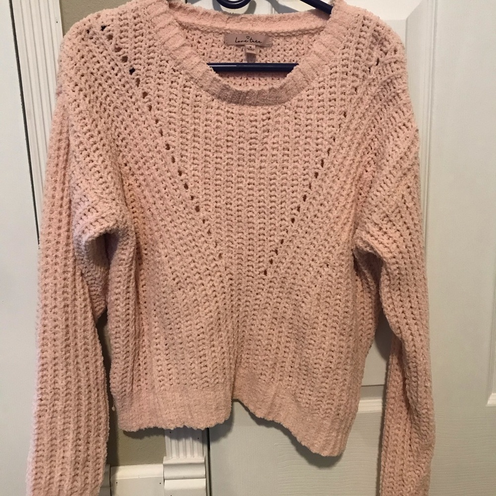 Soft pink knitted sweater
